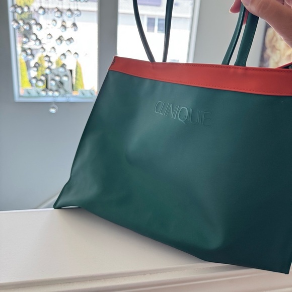 Clinique Handbags - Clinique Green and Orange makeup Bag
